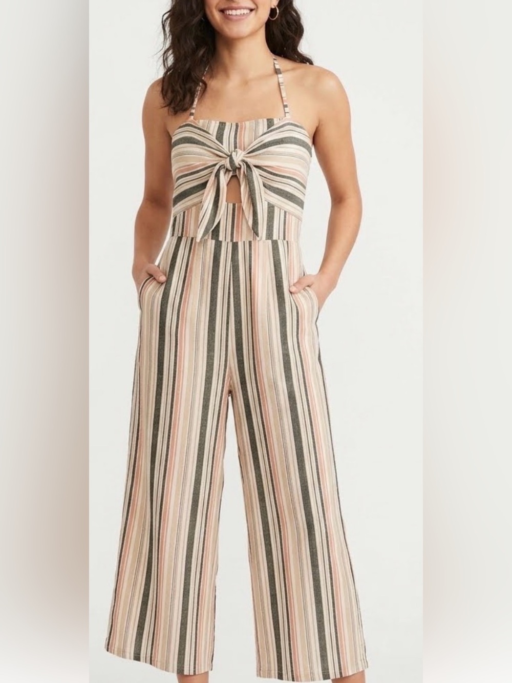 Jumpsuit with back cut nice on the body.